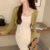 Sunscreen cardigan knitted jacket for women in the summer of 2024 thin suspender skirt top up ice silk short camisole jacket